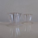 A pair of vintage lucite candle holders