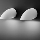 A pair of Gomito wall lamps