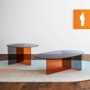 Chap coffee tables in fue and amber color crystal.