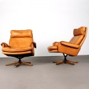 A pair of Strassle armchairs