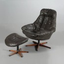 Henry W. Klein armchair with matching stool